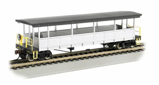 BACHMANN UNLETTERED SILVER OPEN SIDED EXCUSION CAR W/SEATS. HO SCALE