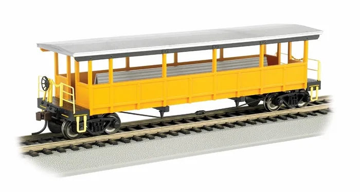 BACHMANN UNLETTERED SILVER-YELLOW OPEN SIDED EXCURSION CAR W/SEATS. HO SCALE